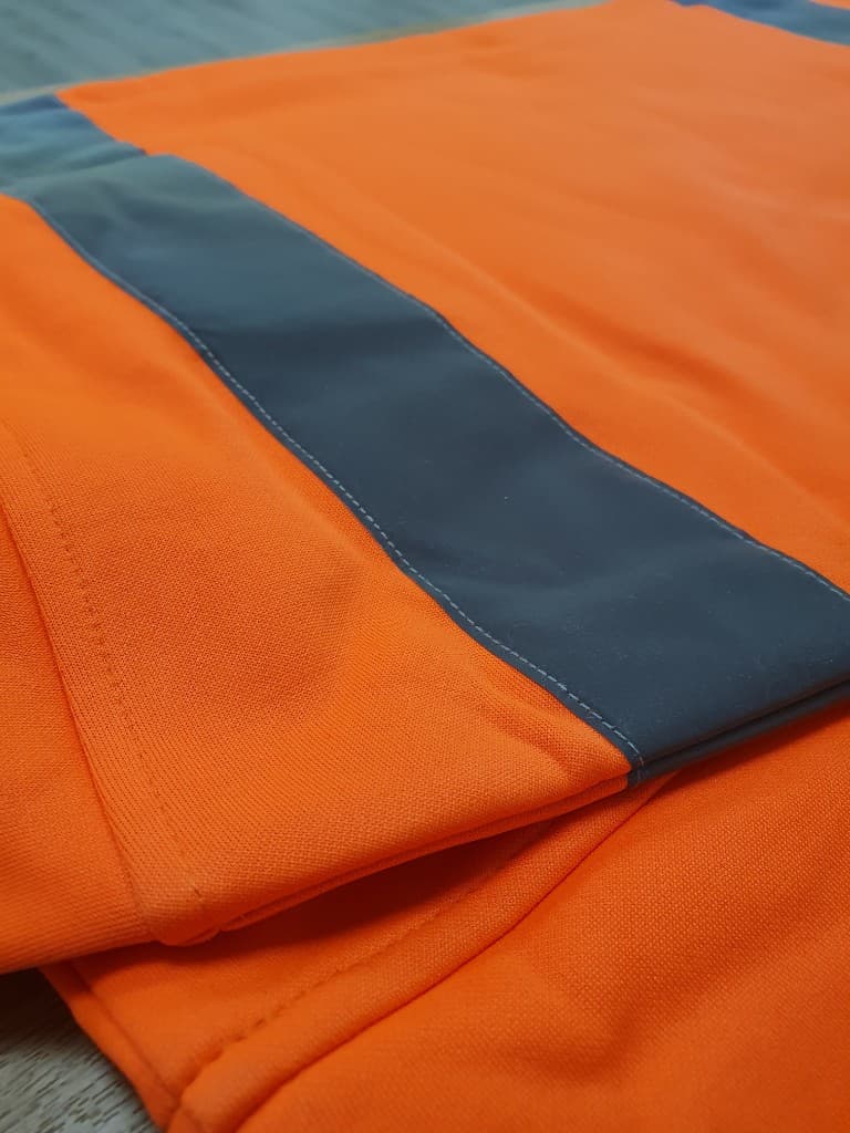Retroreflective tape detail on hi-vis safety garment