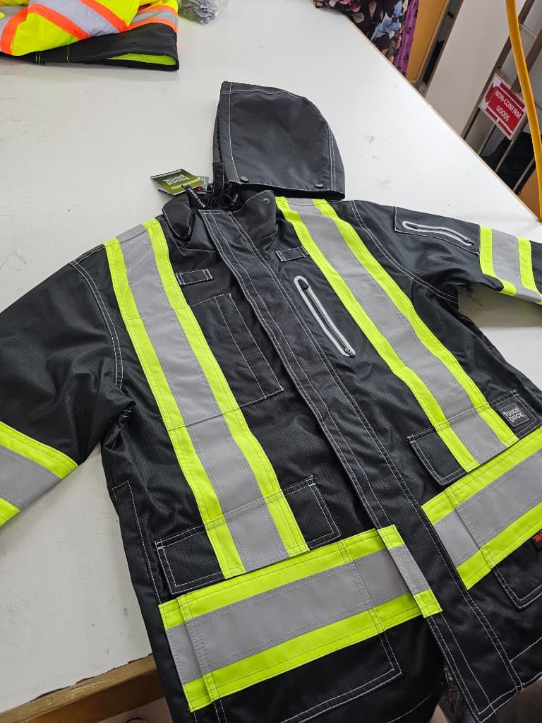 Black hi-vis safety jacket with lime-yellow and silver reflective tape