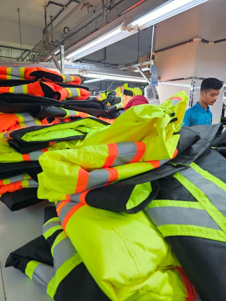 Hi-vis jackets staged on Bangladesh factory production line
