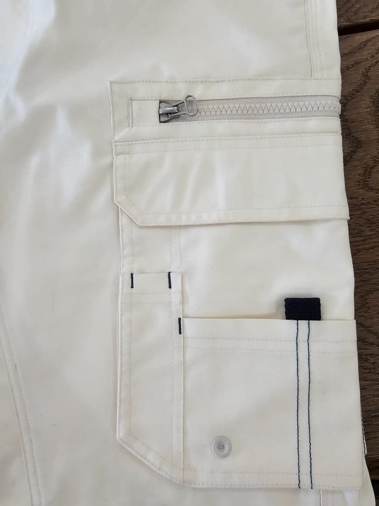 Multi-pocket cargo trousers with zip pocket and reinforced tool slots
