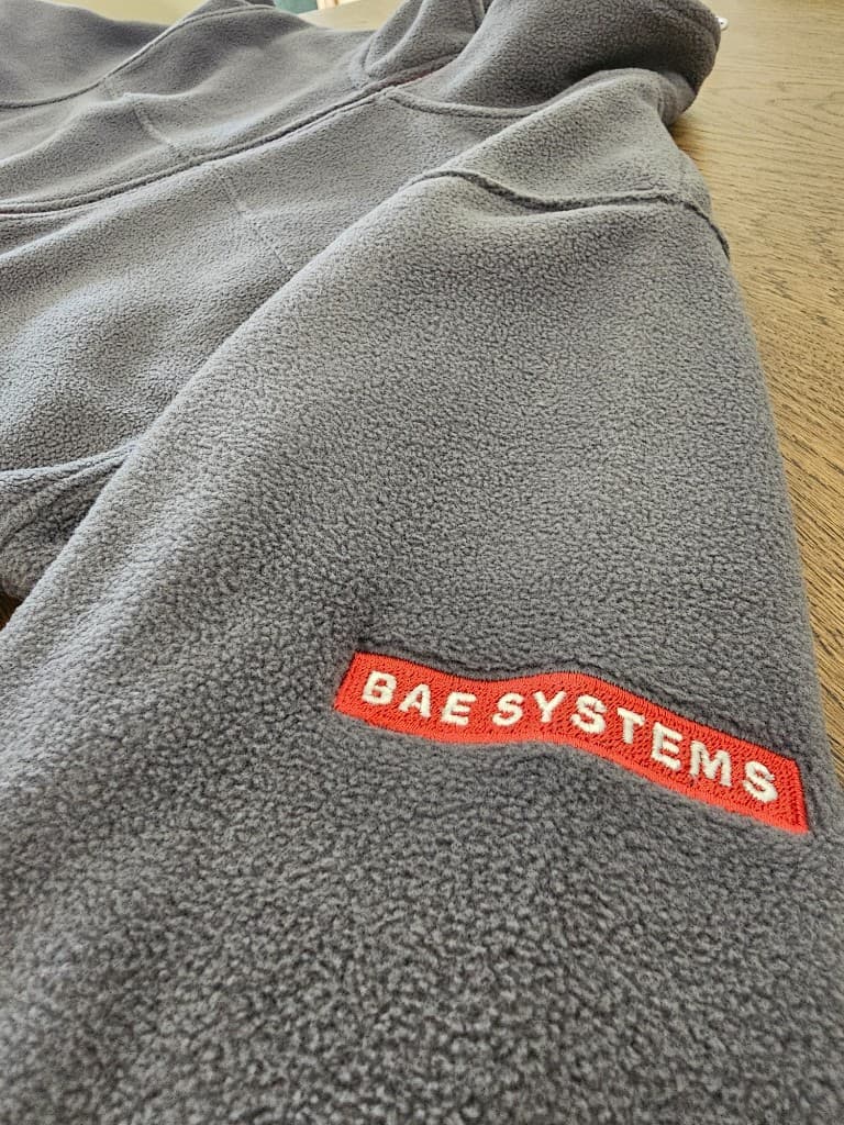 Branded corporate fleece with sleeve embroidery for uniform programme