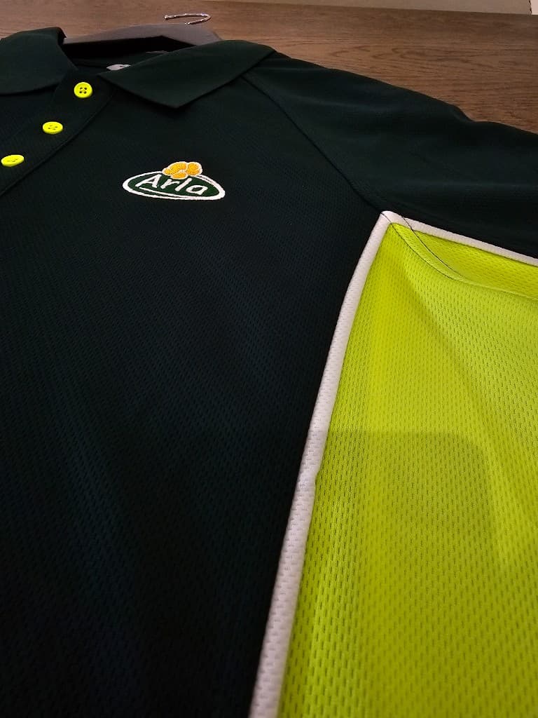 Branded hi-vis corporate polo with chest embroidery for uniform programme